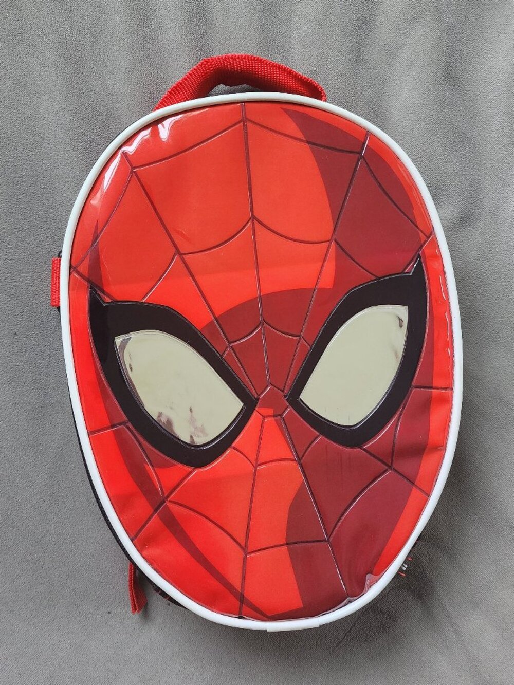 Marvel Spider-Man insulated lunch box featuring head-shaped design.